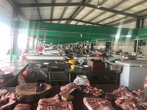 非洲猪瘟疫情中的连云港农贸市场 猪肉卖不动,多商铺暂歇业